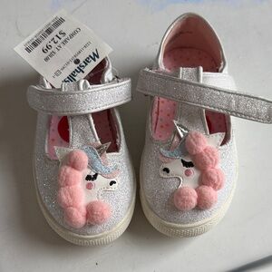 cupcakes & cashmere Silver Glitter Unicorn Mary Janes with Pink Pom Accents